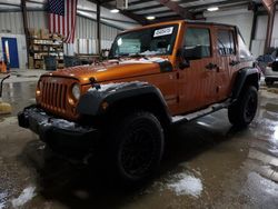 Salvage cars for sale at West Mifflin, PA auction: 2011 Jeep Wrangler Unlimited Sport