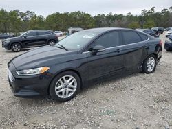 Salvage cars for sale at Houston, TX auction: 2015 Ford Fusion SE