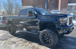 Salvage trucks for sale at North Billerica, MA auction: 2015 GMC Sierra K2500 SLT