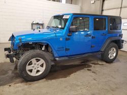 Salvage cars for sale at Blaine, MN auction: 2015 Jeep Wrangler Unlimited Sport