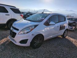 Salvage cars for sale at Magna, UT auction: 2014 Chevrolet Spark 1LT