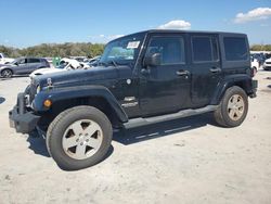 Salvage cars for sale at Apopka, FL auction: 2011 Jeep Wrangler Unlimited Sahara