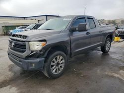 Salvage cars for sale at auction: 2014 Toyota Tundra Double Cab SR