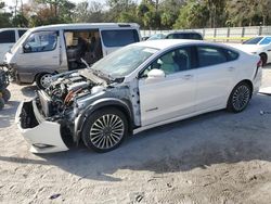 Salvage cars for sale at Fort Pierce, FL auction: 2017 Ford Fusion Titanium HEV