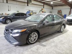 Carros salvage a la venta en subasta: 2018 Toyota Camry Hybrid