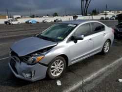 Salvage cars for sale at auction: 2013 Subaru Impreza Premium