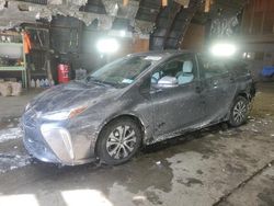 Salvage cars for sale at Albany, NY auction: 2021 Toyota Prius LE