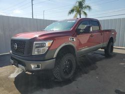 Salvage cars for sale at Riverview, FL auction: 2016 Nissan Titan XD SL