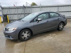 Salvage cars for sale at Florence, MS auction: 2013 Honda Civic Hybrid