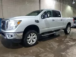 Salvage trucks for sale at Woodhaven, MI auction: 2016 Nissan Titan XD SL