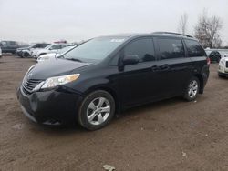 Toyota Sienna LE salvage cars for sale: 2014 Toyota Sienna LE