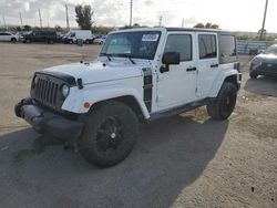 Salvage cars for sale from Copart Miami, FL: 2017 Jeep Wrangler Unlimited Sport