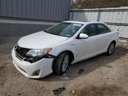 Salvage cars for sale at West Mifflin, PA auction: 2012 Toyota Camry Hybrid