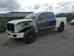 Salvage cars for sale from Copart Orlando, FL: 2019 Nissan Titan XD SL