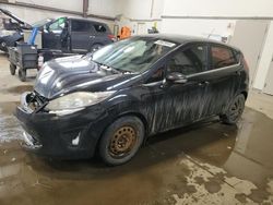 Salvage cars for sale at Nisku, AB auction: 2011 Ford Fiesta SES