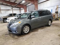 Salvage cars for sale from Copart Lansing, MI: 2013 Toyota Sienna XLE