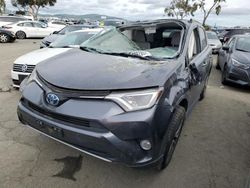 Salvage cars for sale at Martinez, CA auction: 2018 Toyota Rav4 HV LE