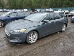 Salvage cars for sale from Copart Graham, WA: 2016 Ford Fusion SE