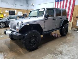 Salvage cars for sale from Copart Kincheloe, MI: 2013 Jeep Wrangler Unlimited Sahara