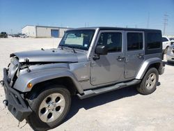 Salvage cars for sale from Copart Haslet, TX: 2013 Jeep Wrangler Unlimited Sahara