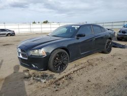 Salvage cars for sale from Copart Bakersfield, CA: 2013 Dodge Charger SXT