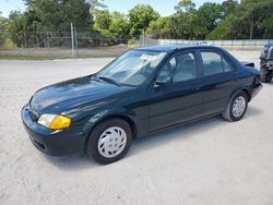 Salvage cars for sale at Fort Pierce, FL auction: 1999 Mazda Protege DX
