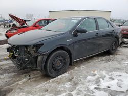 Salvage cars for sale at Rocky View County, AB auction: 2012 Toyota Camry Hybrid