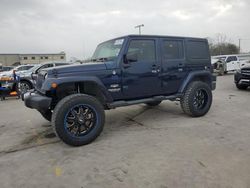 Vehiculos salvage en venta de Copart Wilmer, TX: 2013 Jeep Wrangler Unlimited Sahara