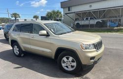 Salvage cars for sale from Copart Orlando, FL: 2012 Jeep Grand Cherokee Laredo