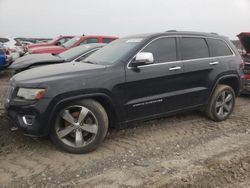 Buy Salvage Cars For Sale now at auction: 2014 Jeep Grand Cherokee Overland