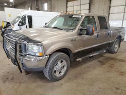 Salvage trucks for sale at Blaine, MN auction: 2004 Ford F350 SRW Super Duty