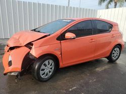 Salvage cars for sale from Copart Riverview, FL: 2013 Toyota Prius C