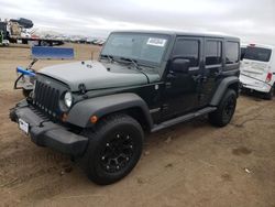 Salvage cars for sale from Copart Brighton, CO: 2012 Jeep Wrangler Unlimited Sport