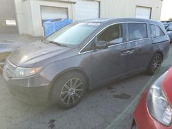 Salvage cars for sale from Copart Woodburn, OR: 2011 Honda Odyssey EXL