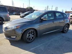 Salvage cars for sale from Copart Wilmington, CA: 2017 Ford Focus SEL