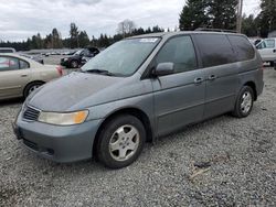 Salvage cars for sale from Copart Graham, WA: 2000 Honda Odyssey EX