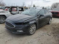 Vehiculos salvage en venta de Copart Lansing, MI: 2017 Ford Fusion Titanium