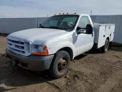 Salvage trucks for sale at Brighton, CO auction: 2000 Ford F350 Super Duty