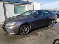 Salvage cars for sale from Copart Sun Valley, CA: 2017 Toyota Camry XSE