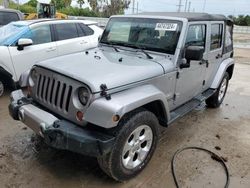 Salvage cars for sale from Copart Riverview, FL: 2013 Jeep Wrangler Unlimited Sahara