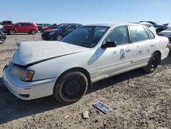 Salvage cars for sale from Copart Earlington, KY: 1999 Toyota Avalon XL