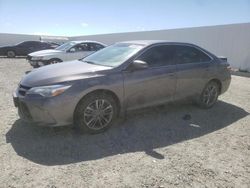 Salvage cars for sale from Copart Adelanto, CA: 2016 Toyota Camry LE