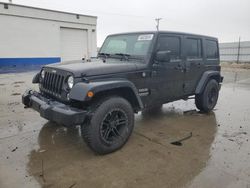 Salvage cars for sale from Copart Farr West, UT: 2015 Jeep Wrangler Unlimited Sport