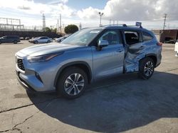 Salvage cars for sale from Copart Wilmington, CA: 2022 Toyota Highlander Hybrid XLE