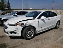 Salvage cars for sale from Copart Rancho Cucamonga, CA: 2017 Ford Fusion SE Hybrid