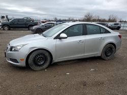 Salvage cars for sale from Copart London, ON: 2011 Chevrolet Cruze LT
