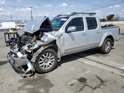 Salvage trucks for sale at Colton, CA auction: 2010 Nissan Frontier Crew Cab SE