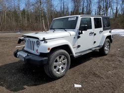 Vehiculos salvage en venta de Copart Bowmanville, ON: 2013 Jeep Wrangler Unlimited Sahara