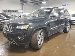 Jeep Grand Cherokee salvage cars for sale: 2014 Jeep Grand Cherokee Overland