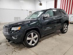 Jeep Grand Cherokee salvage cars for sale: 2014 Jeep Grand Cherokee Overland